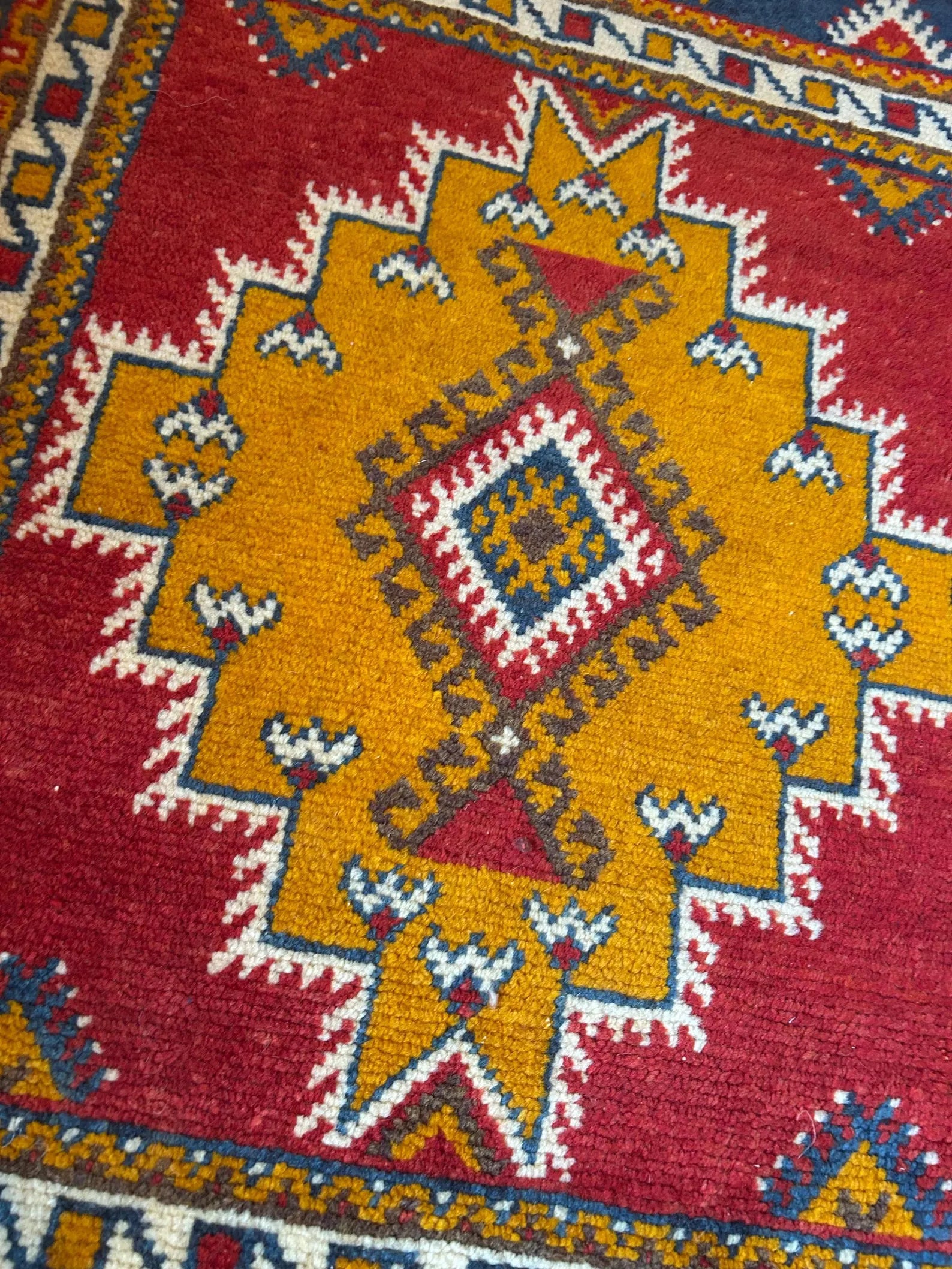 Authentic wool rug made by Berber artisans.