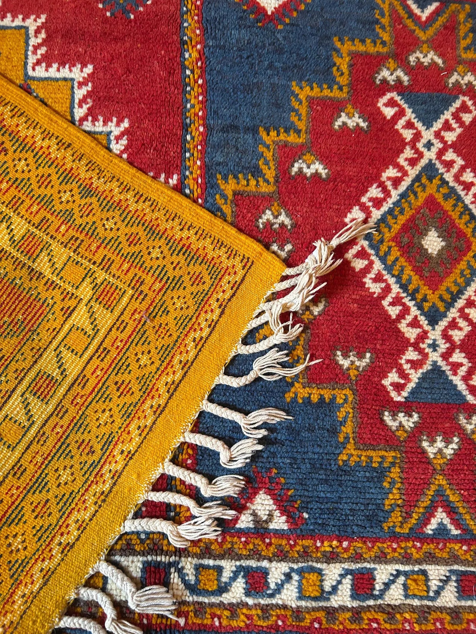 Authentic wool rug made by Berber artisans.