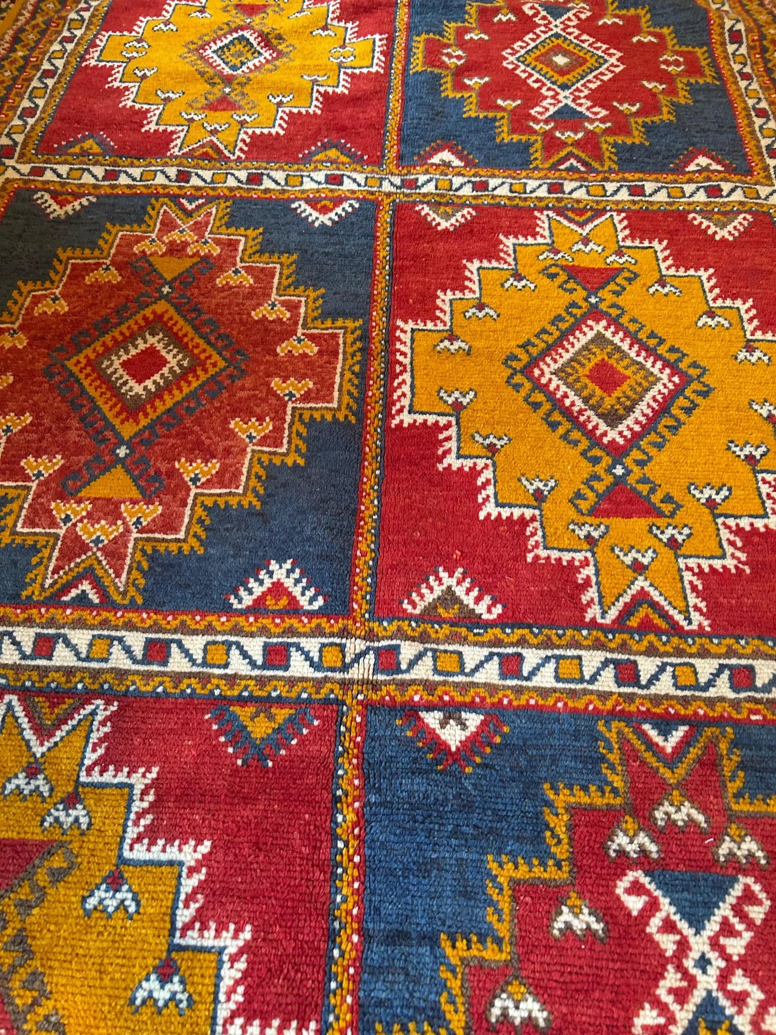 Authentic wool rug made by Berber artisans.